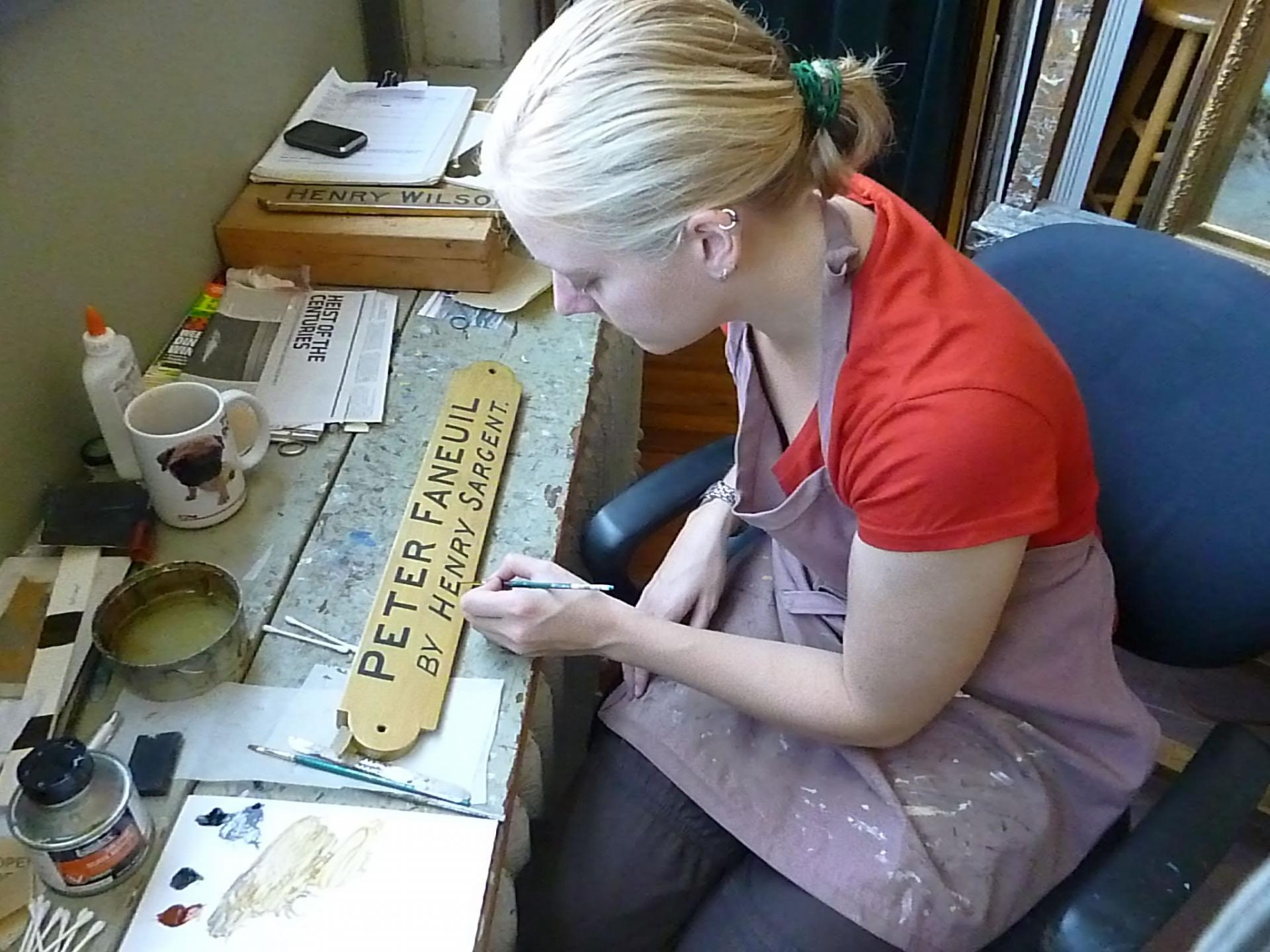 Stephanie working on nameplate